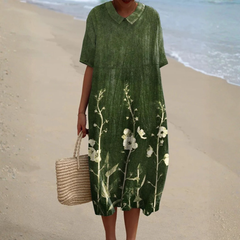 Vestito midi donna verde con colletto e rami fioriti bianchi sulla gonna