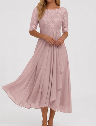 Vestito midi rosa con corpetto ricamato traforato e gonna svasata drappeggiata