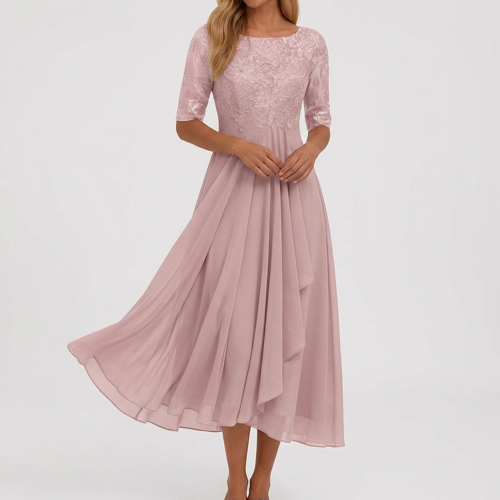 Vestito midi rosa con corpetto ricamato traforato e gonna svasata drappeggiata